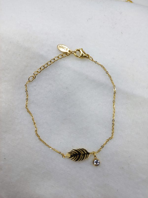 Bracelet en acier inoxydable avec strass et plume