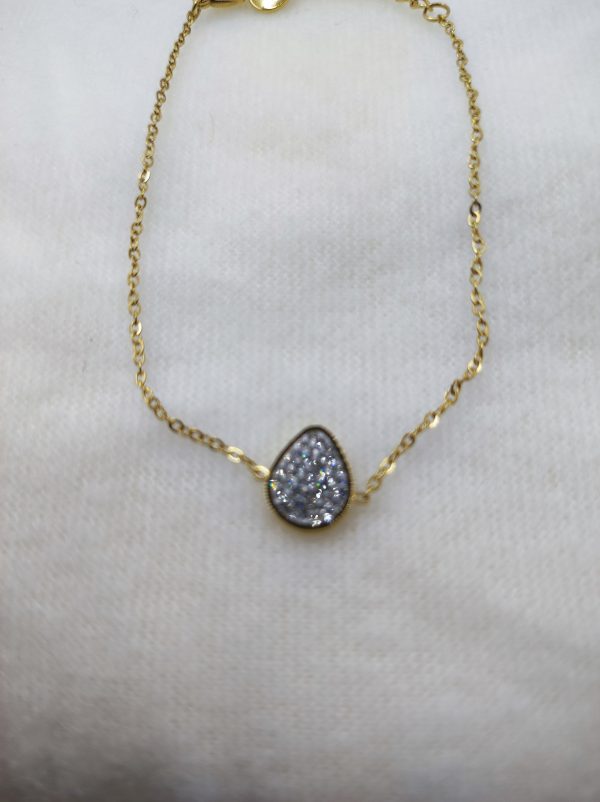 Bracelet en acier inoxydable doré avec strass