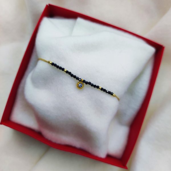 Bracelet perles noires et strass